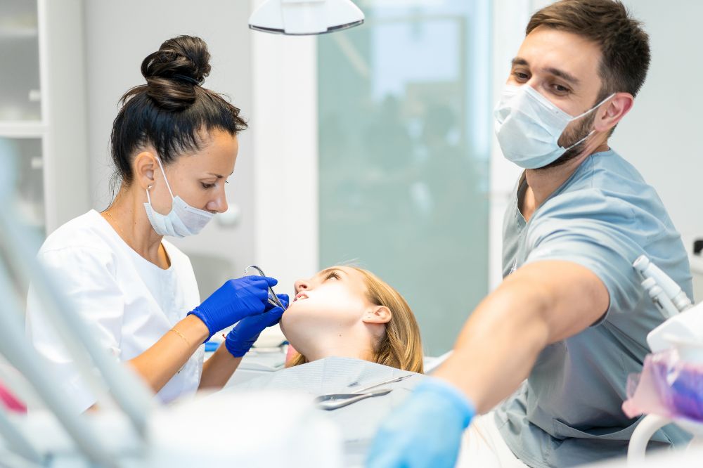 a lady visits our clinic for emergency dental treatment